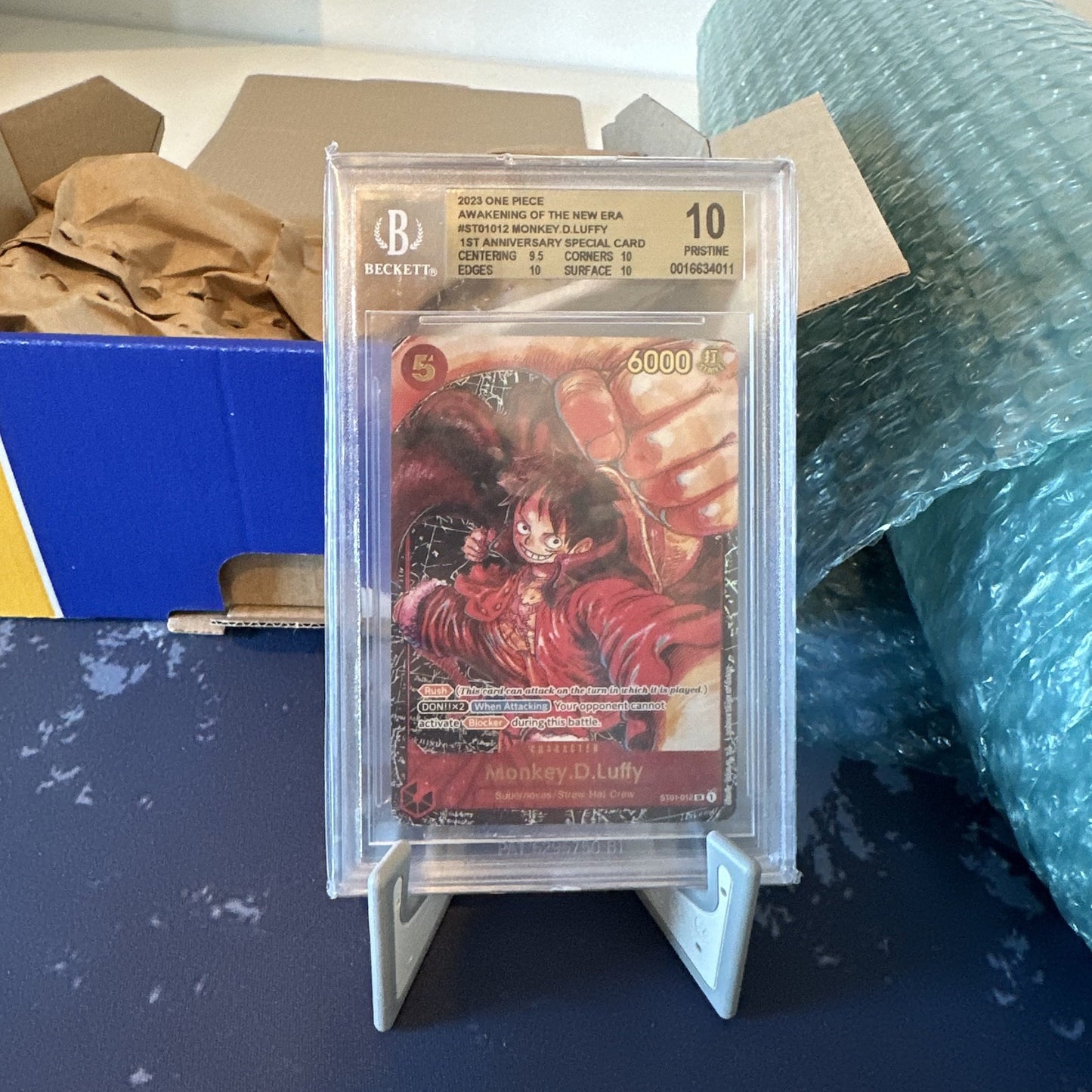 Monkey D. Luffy ST01-012 English OP05 1st Anniversary Special Card, BGS 10 graded front view