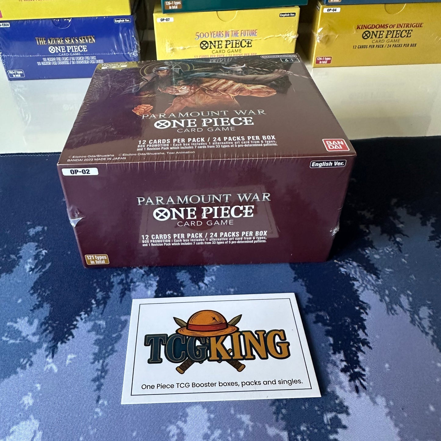 One Piece OP02 Paramount War English booster box, top and side view