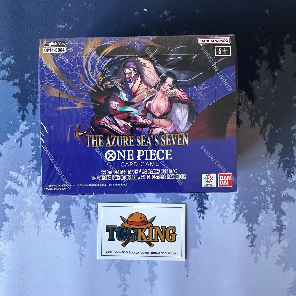 One Piece OP14-EB04 The Azure Sea's Seven English booster box, front view